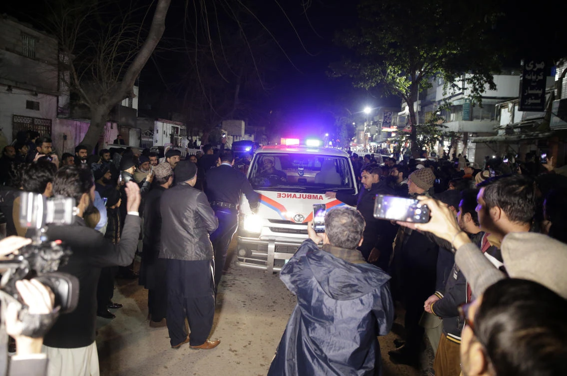 Ambulance carry the dead body of victim after they lost their life after a heavy snowfall-hit area in Murree, some 28 miles (45 kilometers) north of the capital of Islamabad, Pakistan, Saturday, Jan. 8, 2022. (AP)