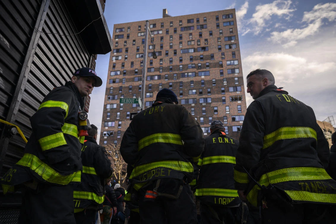 A malfunctioning electric space heater apparently started the fire Sunday in the 19-story building in the Bronx, fire officials said. (AFP)