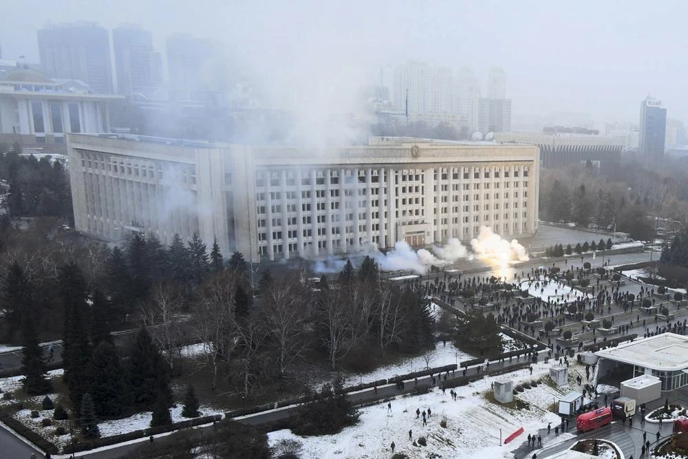 Smoke rises from the city hall building during a protest in Almaty, Kazakhstan, Wednesday, Jan. 5, 2022. (AP)