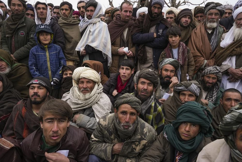 Hundreds of Afghan men gather to apply for the humanitarian aid in Qala-e-Naw, Afghanistan, Tuesday, Dec. 14, 2021. (AP/FILE)
