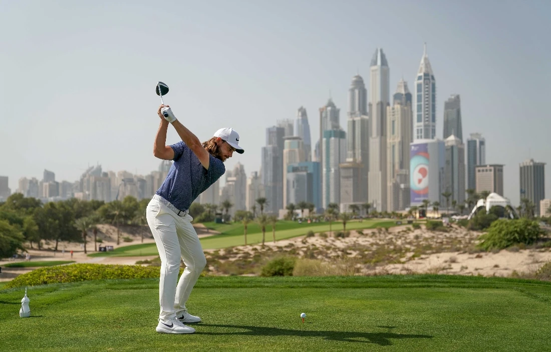 Tommy Fleetwood hits a tee shot on the eighth hole during the final round of the Dubai Desert Classic at the Emirates Golf Club in January 2019. (Getty Images)