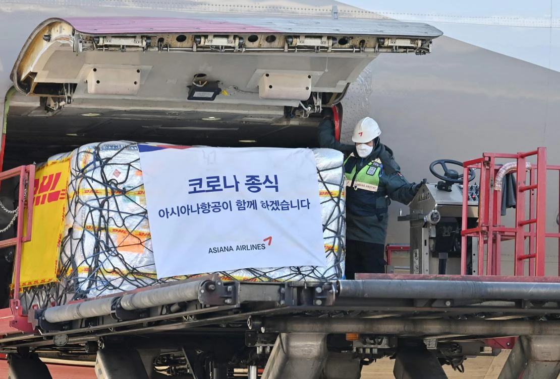Workers were seen unloading containers of the pills from a plane at Incheon International Airport. (AFP)