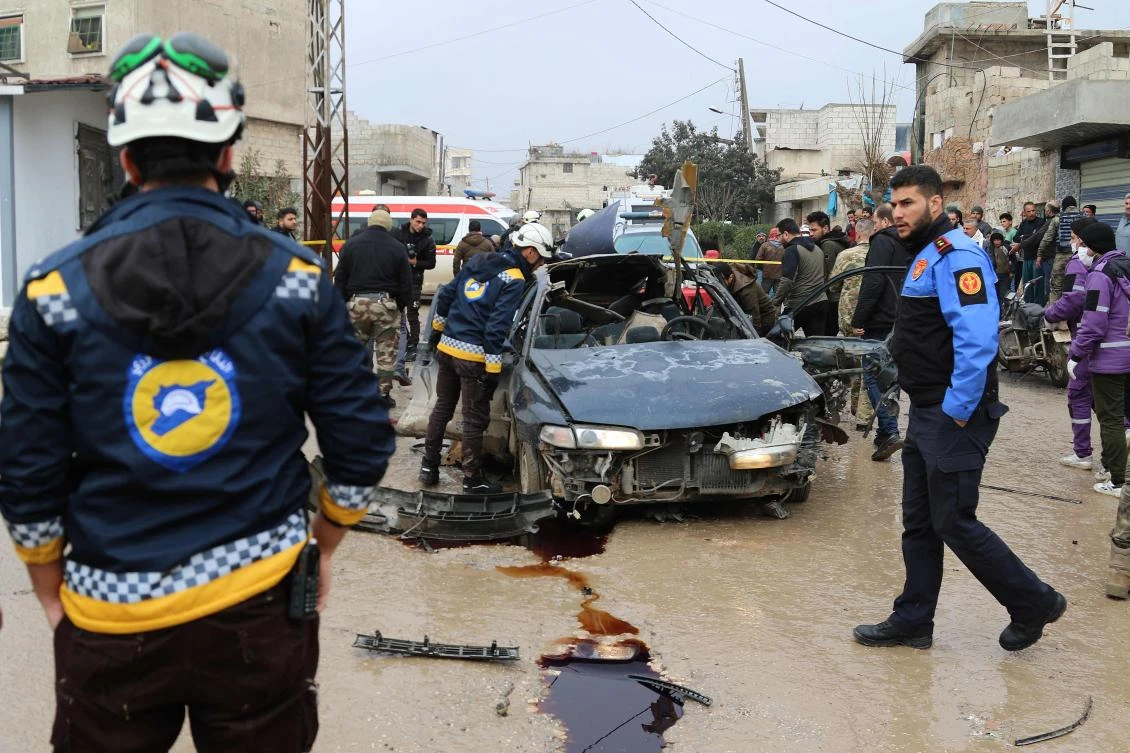 A pictures shows the scene after an explosive device exploded in a taxi in Syria's town of Azaz in the rebel-controlled northern countryside of Syria's Aleppo province, on January 13, 2022 in which at least one person was killed. (Photo by AFP)