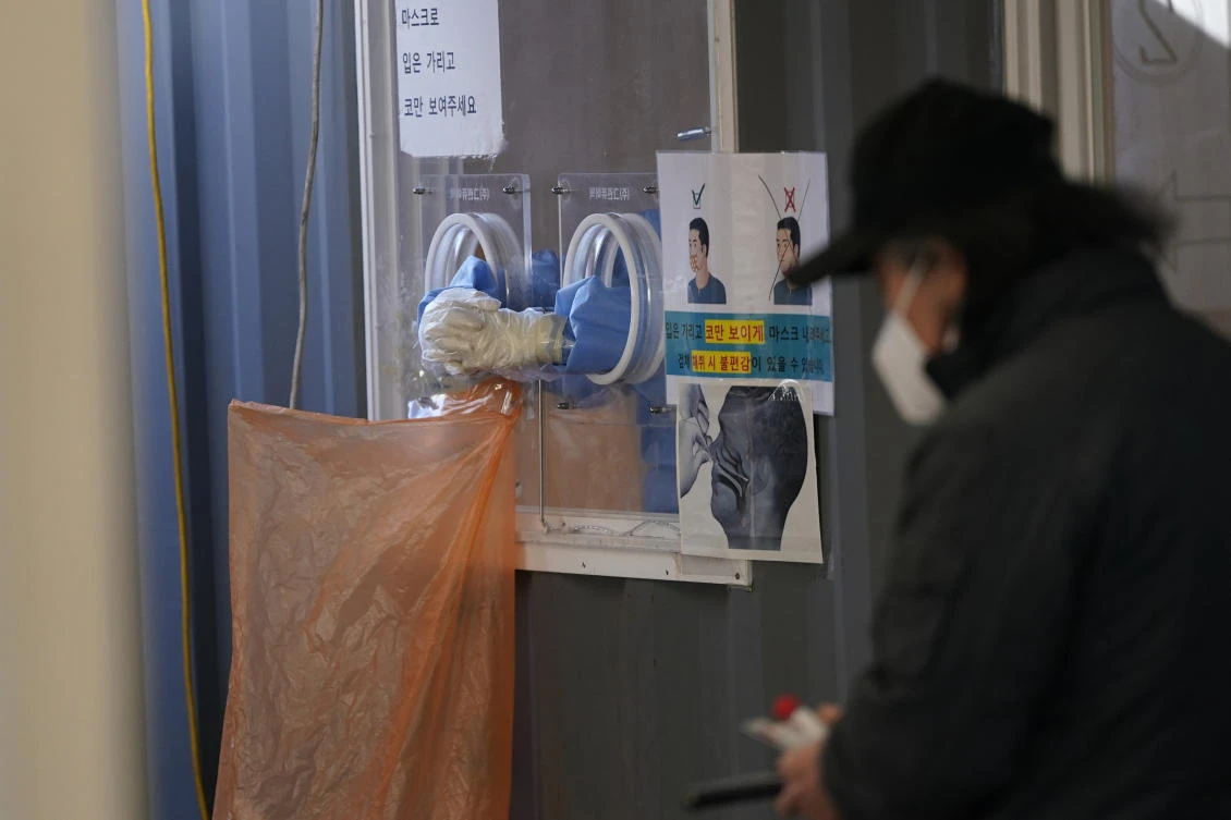 South Korea may see its daily infections jump to levels around 30,000 by the end of February if it substantially loosens social distancing. (AP)