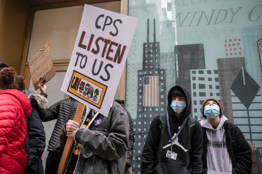 Chicago Public Schools students protest outside the Chicago Public Schools headquarters during a district-wide walkout, Jan. 14, 2022, in Chicago. (AP)