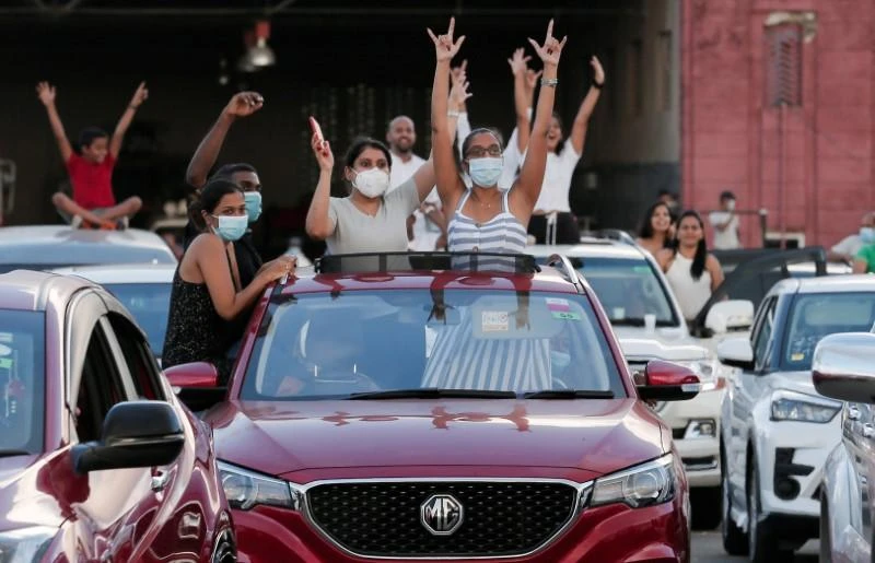 Sri Lankans celebrate the lifting of certain COVID-19 restrictions at a drive-in concert, Colombo, Sri Lanka, May 30, 2020. (Reuters)
