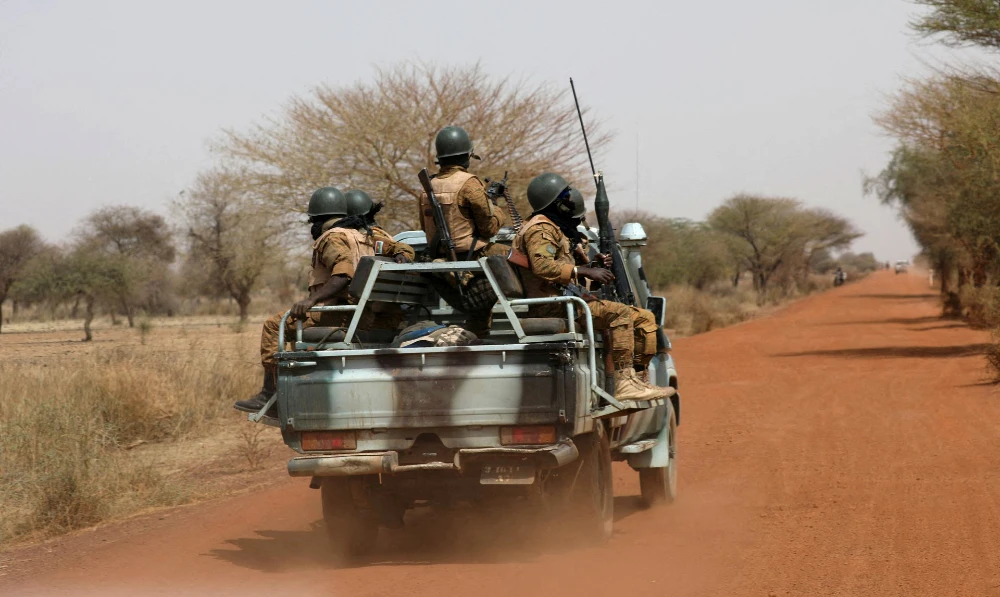 Soldiers from Burkina Faso patrol on the road of Gorgadji in the Sahel area, Burkina Faso. (Reuters/File)