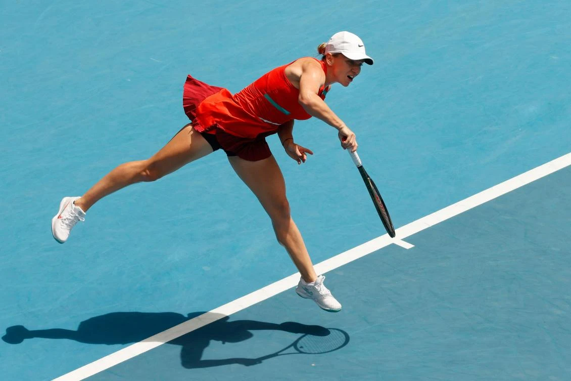 Former world number one Simona Halep struggled to find her groove against the 102nd-ranked Pole Magdalena Frech before banking the win 6-4, 6-3 on Margaret Court Arena. (AFP)