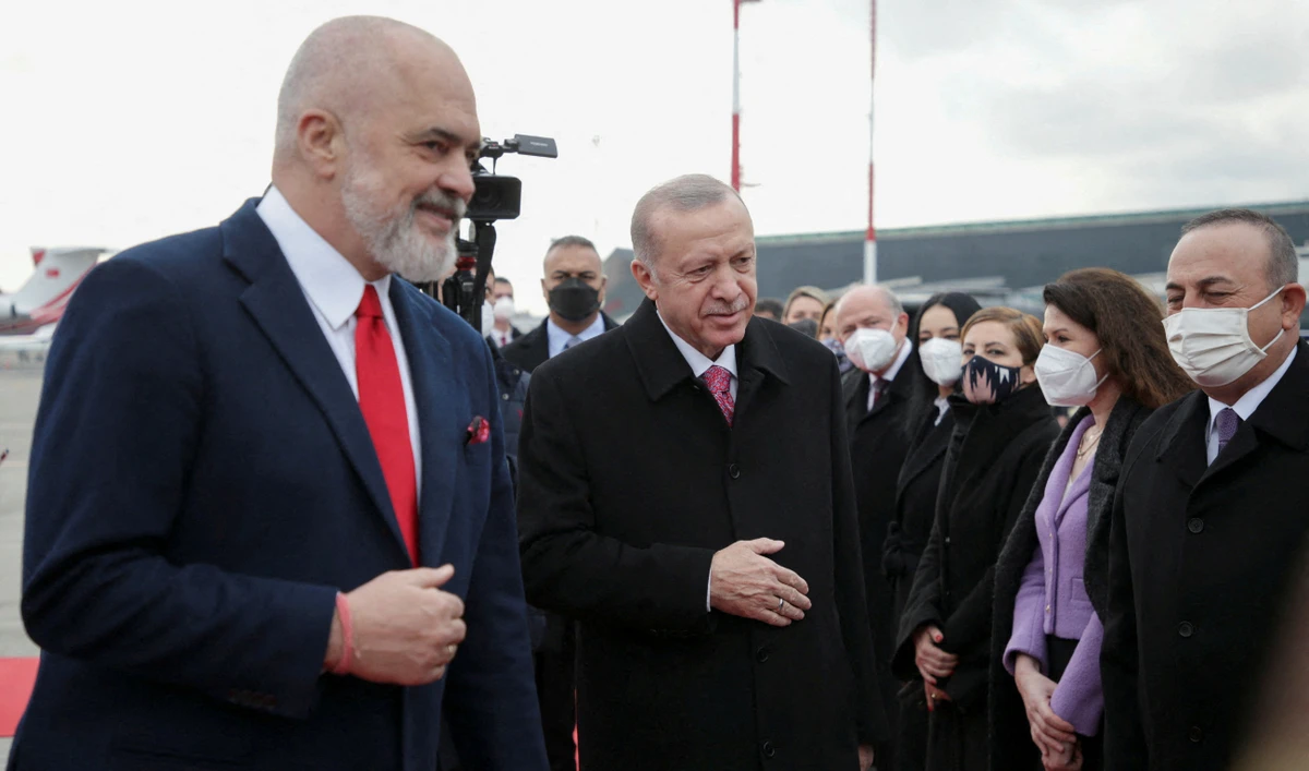 President Recep Tayyip Erdogan is welcomed by Albanian Prime Minister Edi Rama at Tirana airport. (Reuters)