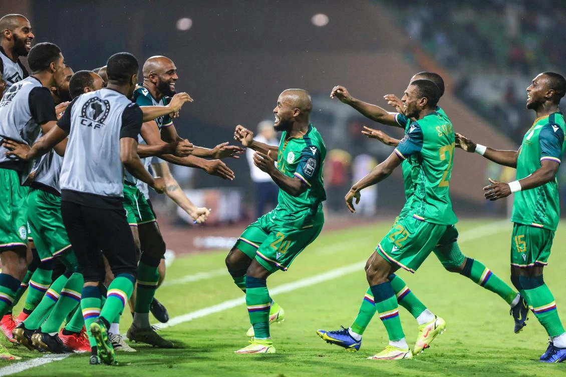 Comoros forward Ahmed Mogni, center, celebrates scoring his team’s second goal during their Africa Cup of Nations game against Ghana, Stade Roumde Adjia, Garoua, Cameroon, Jan. 18, 2022. (AFP)