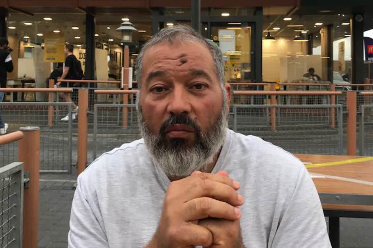 Deghayes, originally Libyan, made a stabbing gesture as he addressed a congregation at the Brighton Mosque and Muslim Community Center. (Abubaker Deghayes)