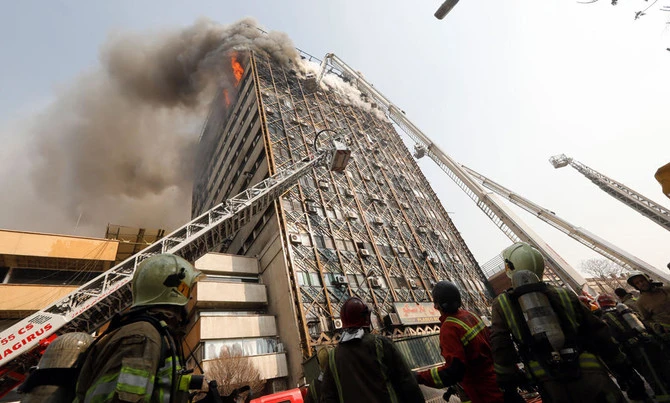 Iran firefighters protest living conditions on deadly blaze anniversary