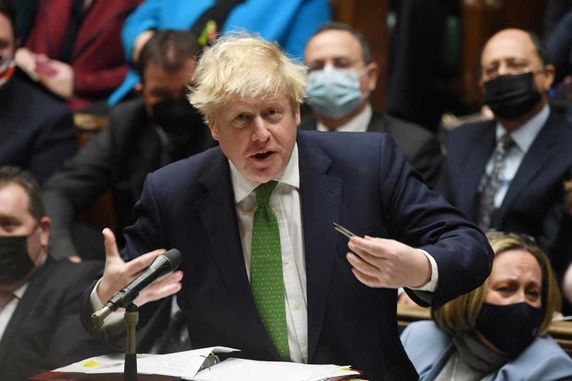 British Prime Minister Boris Johnson speaks during the weekly question time debate at Parliament in London on Wednesday. (Reuters)