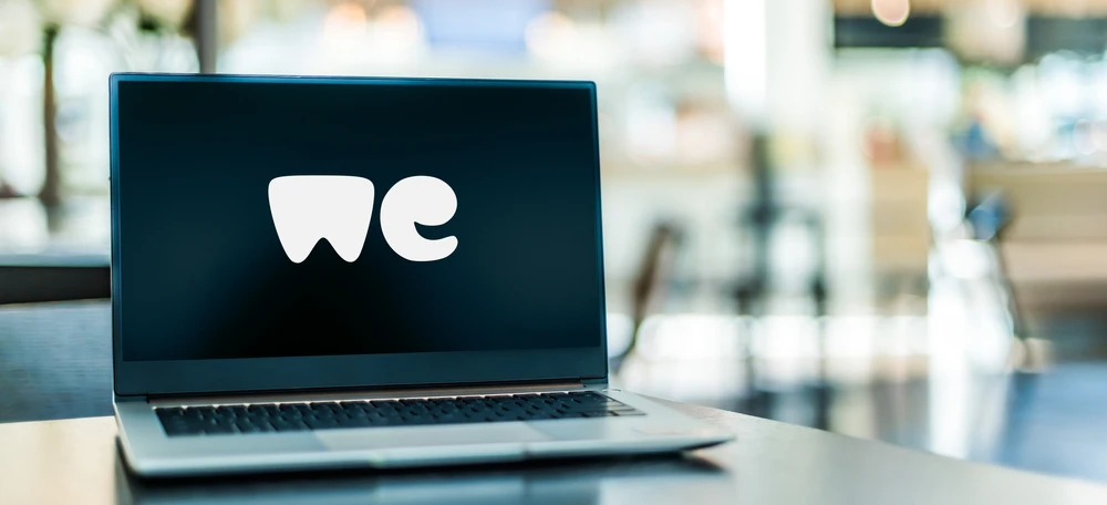 Laptop computer displaying logo of WeTransfer, an internet-based computer file transfer service based in the Netherlands.