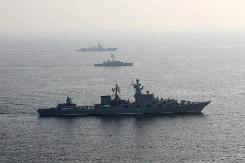 Warships attend a joint naval drill of Iran, Russia and China in the Indian Ocean in this provided photo Jan. 21, 2022 by the Iranian Army. (Iranian Army via AP)