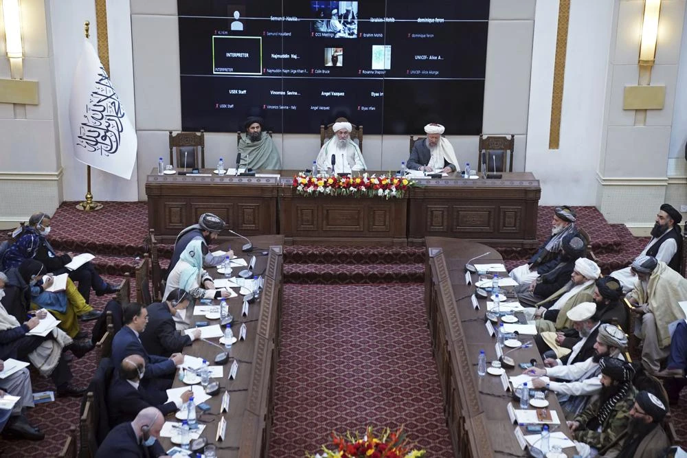 Taliban Prime Minister Mohammad Hasan Akhund, center, speaks during an economic conference at the former Presidential Palace in Kabul, Afghanistan, Wednesday, Jan. 19, 2022. (AP)