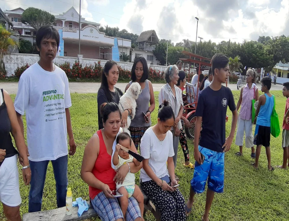 People gather on a field after an earthquake struck the Batanes Province, in northern Philippines. (REUTERS file photo)