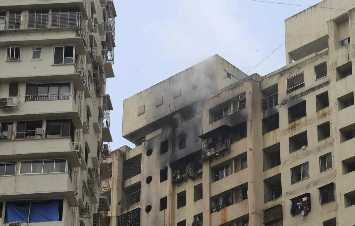 Smoke rises from a building that caught fire in Mumbai. (AP)