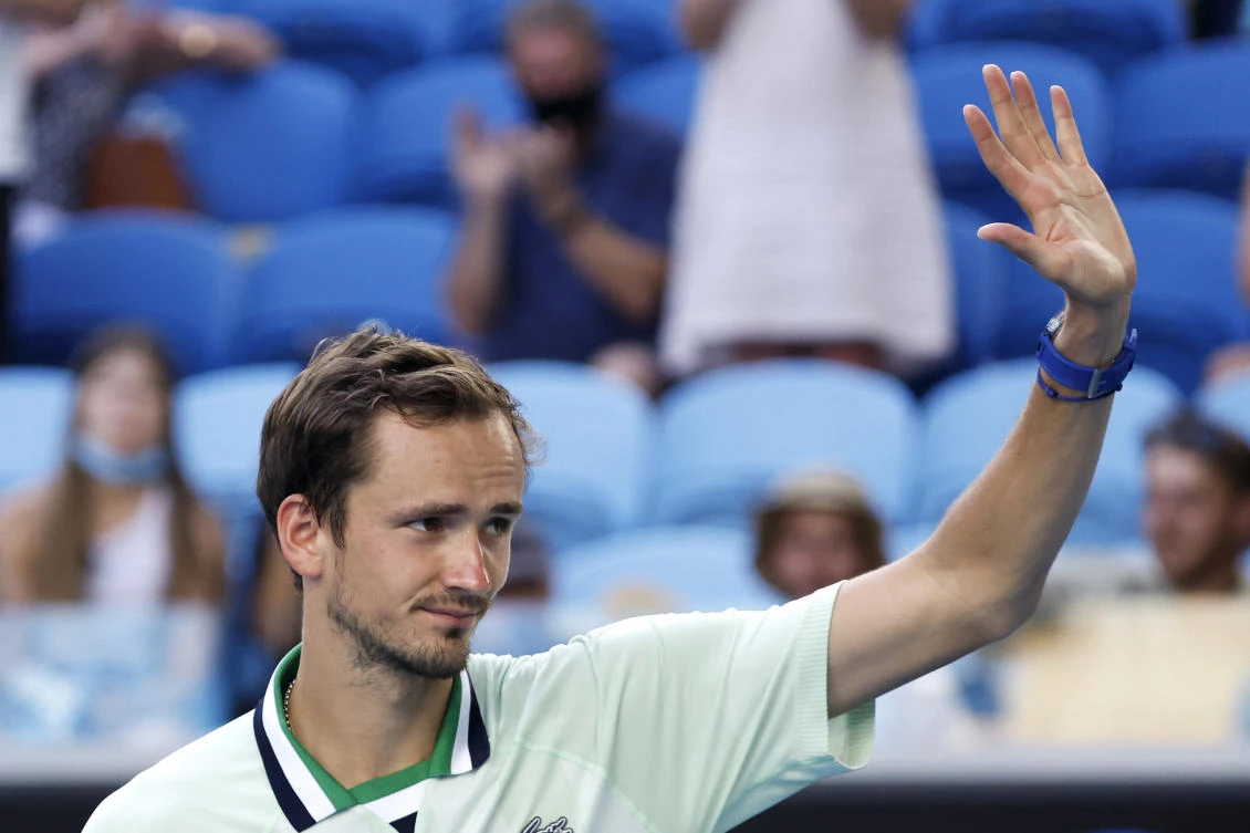 Daniil Medvedev of Russia waves after defeating Maxime Cressy of the US following their fourth round match at the Australian Open tennis championships in Melbourne on Monday. (AP)