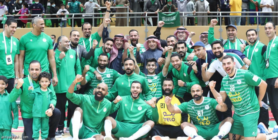 Saudi Arabia's players celebrate reaching the semi-finals of the Asian Handball Championship in Dammam. (Saudi Handball Federation)