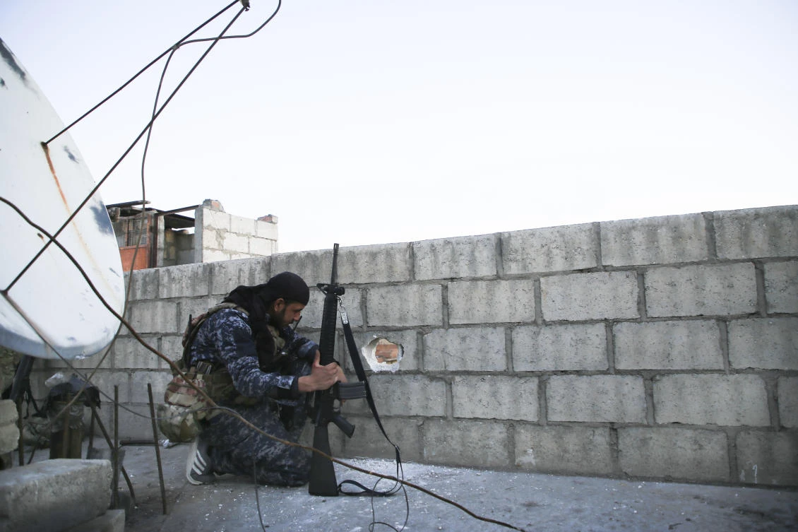 Dozens of armed Daesh militants still hold corner of Syria prison
