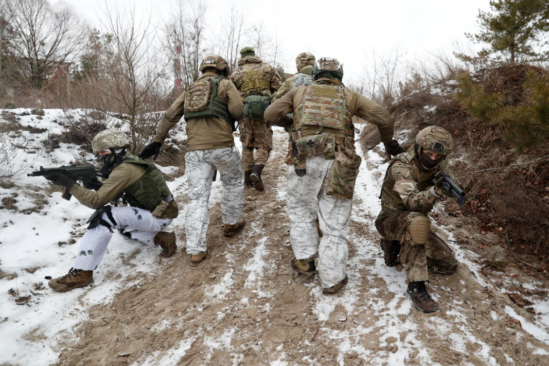 Reservists of the Ukrainian Territorial Defense Forces take part in military exercises on the outskirts of Kyiv, Ukraine on Saturday. (Reuters)