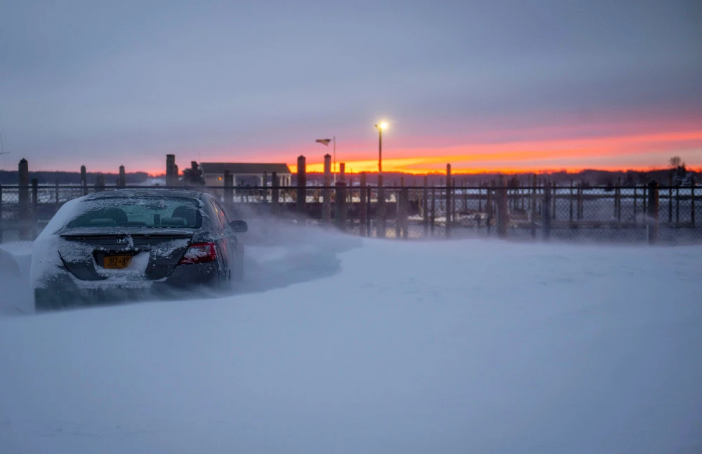 Winter storm lashes East Coast with deep snow, high winds