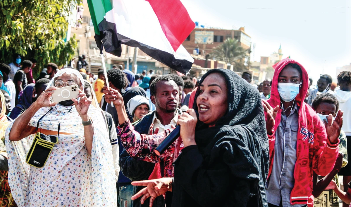 A Sudanese protester speaks during a rally on Sunday in Khartoum to protest against last year’s military coup. The Oct. 25 coup derailed a civilian-military power-sharing deal. (AFP)
