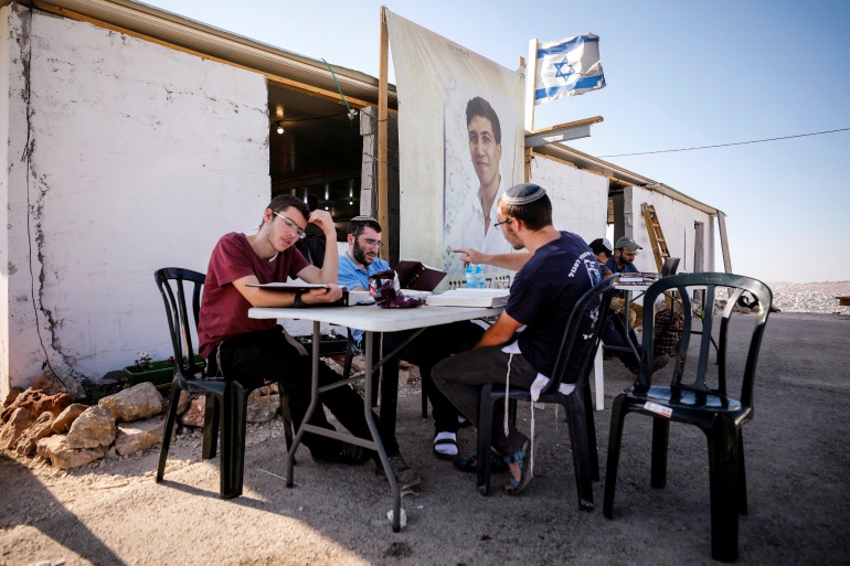 Jewish settlers in Eviatar, an Israeli outpost near the Palestinian village of Beita, in the Israeli-occupied West Bank. (Reuters)