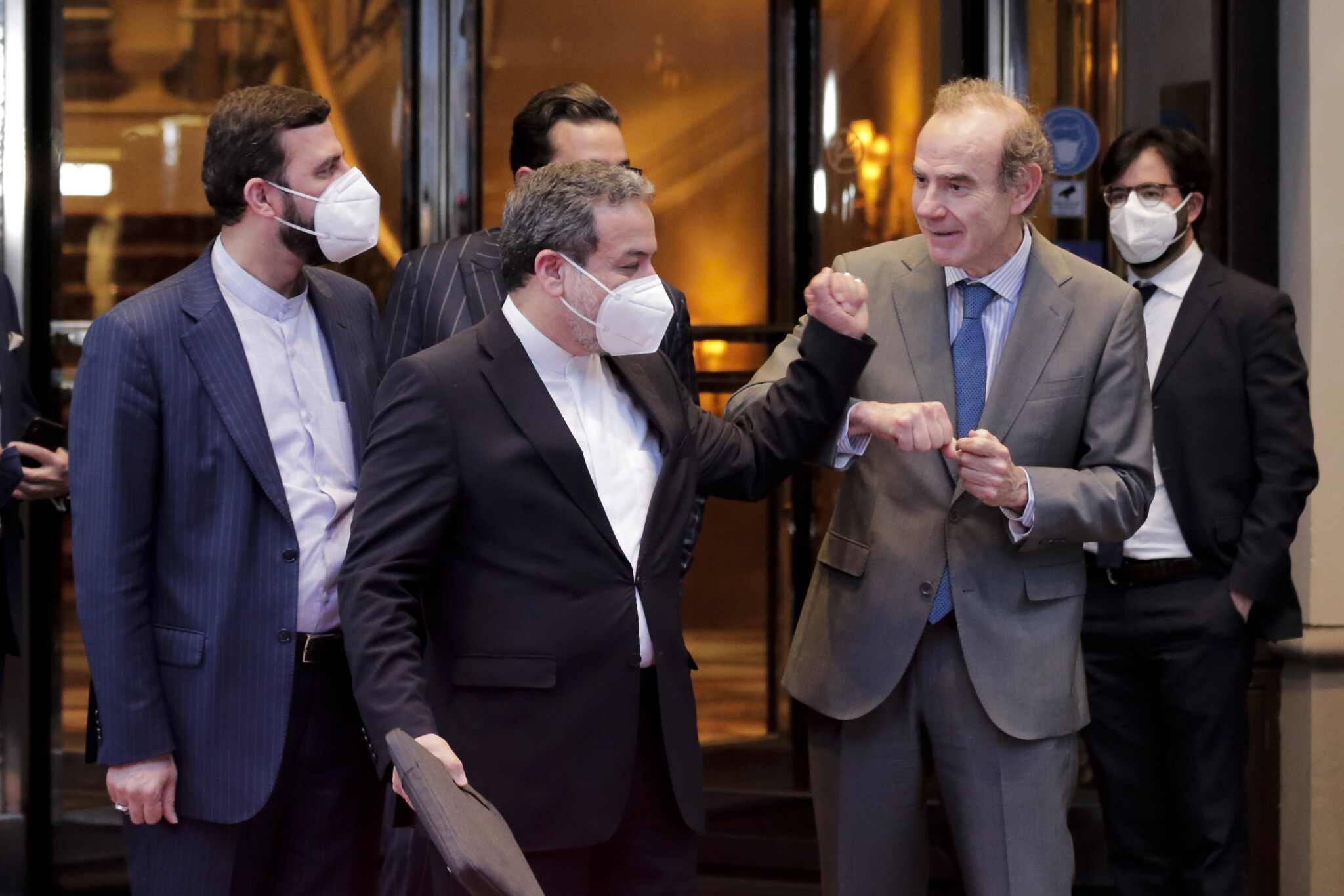 Kazem Gharib Abadi, Abbas Araghchi and Enrique Mora leave the Grand Hotel Vienna after closed-door nuclear talks, Austria, June 2, 2021. (AP Photo)