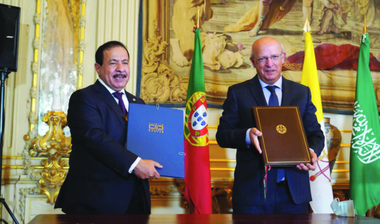 KAICIID chief Faisal bin Abdulrahman bin Muammar and Portuguese Foreign Minister Augusto Santos Silva signed the agreement to move the center's HQ to Lisbon. (Supplied)
