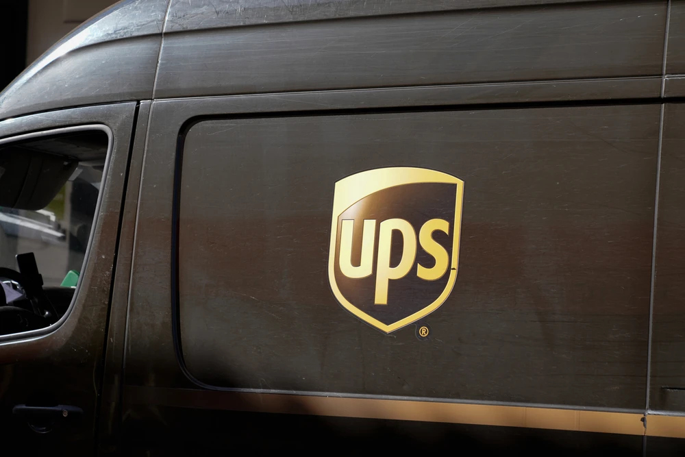 UPS delivers rosy outlook for 2022 after record earnings, shares soar