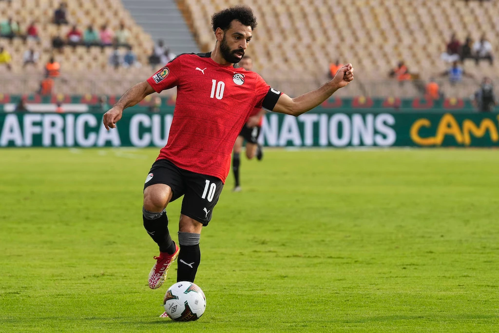 Egypt's Mohamed Salah controls the ball during the African Cup of Nations 2022 quarter-final soccer match between Egypt and Morocco at the Ahmadou Ahidjo stadium in Yaounde, Cameroon, Sunday, Jan. 30, 2022. (AP)