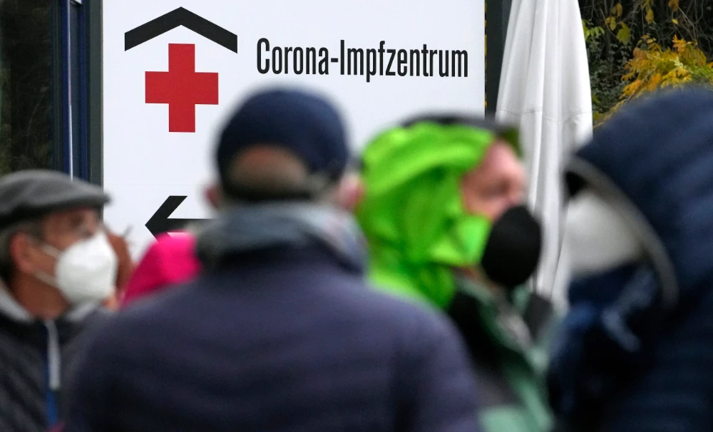 People queue in front of a vaccination center at the City's fairground in Berlin, Germany. (AP/File)