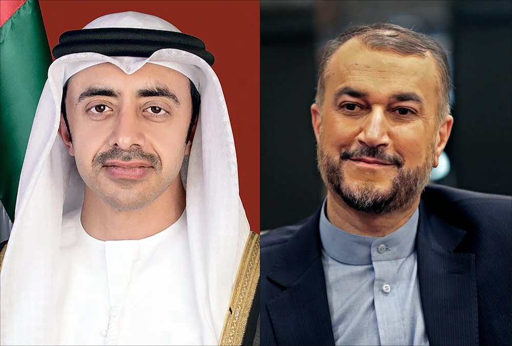 UAE Foreign Minister Sheikh Abdullah bin Zayed (L) holds a phone call with his Iranian counterpart Hossein Amir Abdollahian. (File/WAM/AFP)