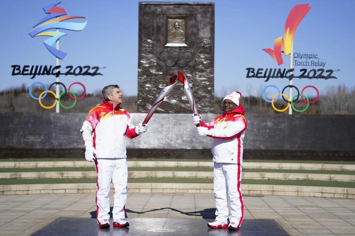With rings breaking from block of ice, Winter Olympics ceremony begins