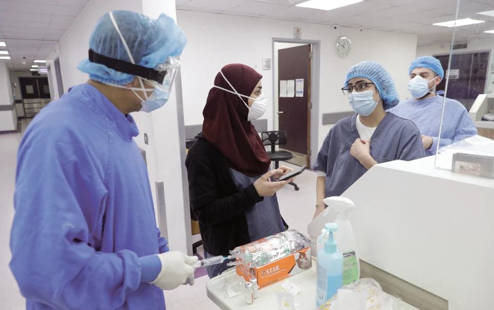 The Syndicate of Hospitals in Lebanon has expressed concern whether hospital staff was becoming a ‘punching bag’ amid the economic crisis. (File/AFP)