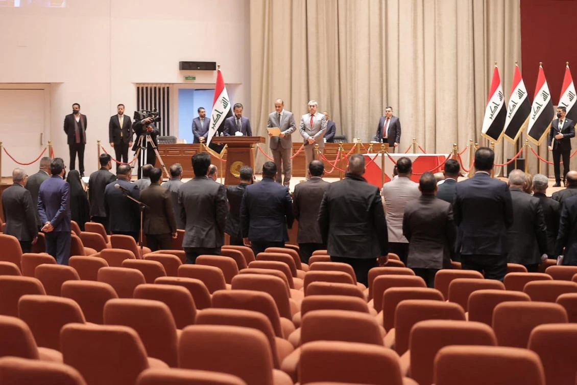 A picture hows few Iraqi lawmakers attending a scheduled parliament session in Baghdad, with most major political blocs boycotting it. (AFP)