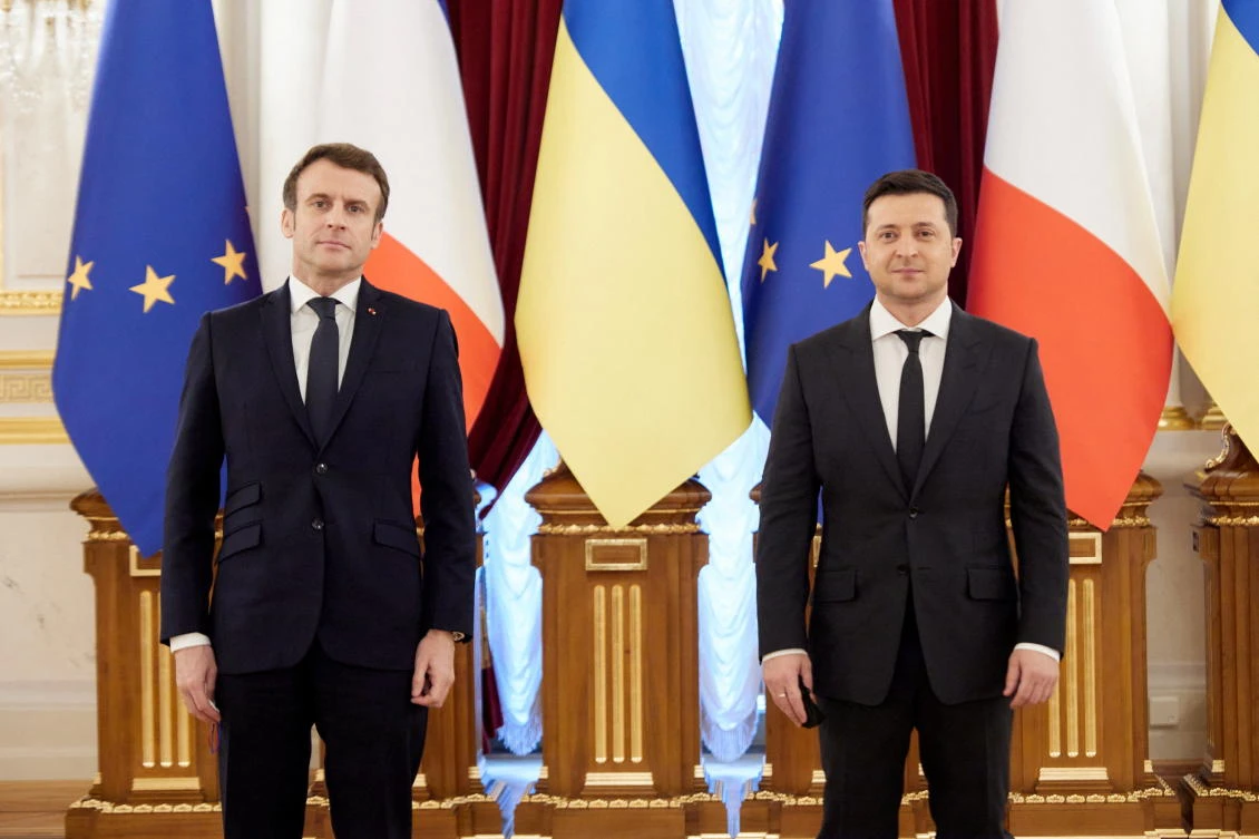 Ukrainian President Volodymyr Zelenskiy and French President Emmanuel Macron pose for a picture before their talks in Kyiv, Ukraine February 8, 2022. (Reuters)