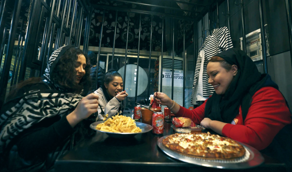 Iranians dine at restaurant-prison ‘Cell 16’ in eastern Tehran. (AFP)