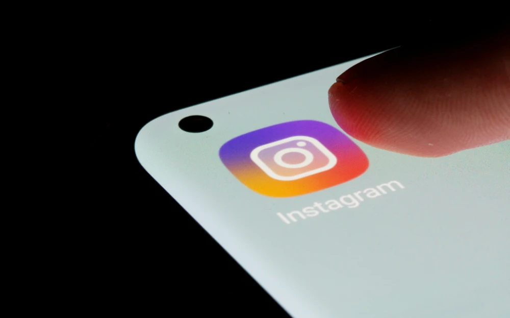 Instagram app is seen on a smartphone in this illustration taken, July 13, 2021. (REUTERS)