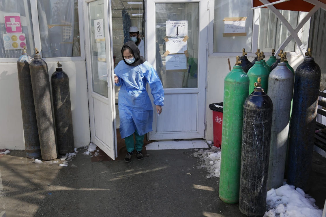 At Kabul’s only COVID-19 treatment hospital, staff can only heat the building at night because of lack of fuel, even as winter temperatures drop below freezing during the day. (File/AP)