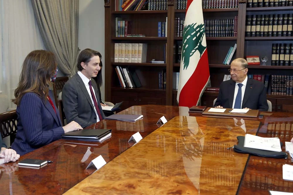 Lebanon’s President Michel Aoun meets with Amos Hochstein, the US envoy for energy affairs, and Dorothy Shea, US Ambassador to Lebanon, in Beirut, Wednesday, Feb. 9, 2021. (Dalati Nohra)