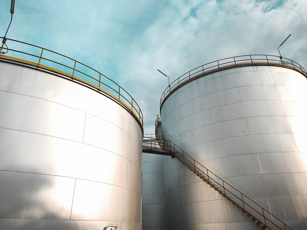 Oil little changed as investors eye US-Iran talks