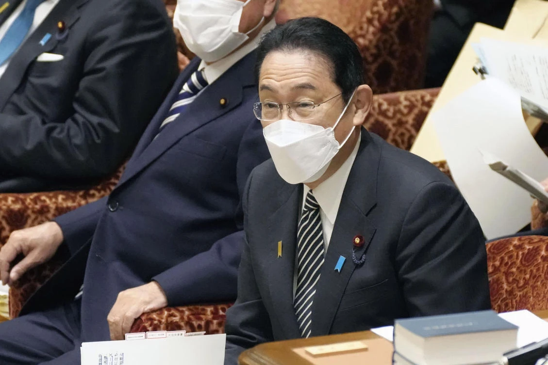 Japan’s Prime Minister Fumio Kishida on Monday pledged to nearly double the COVID-19 booster vaccinations to 1 million doses a day by the end of February. (AP)
