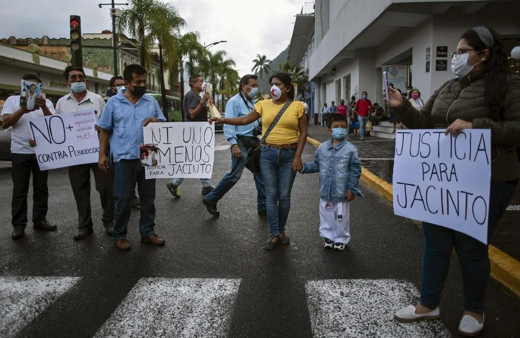 Friends of Mexican journalist Jacinto Romero Flores take part in a protest in demand of justice for his murder. (File/AFP)