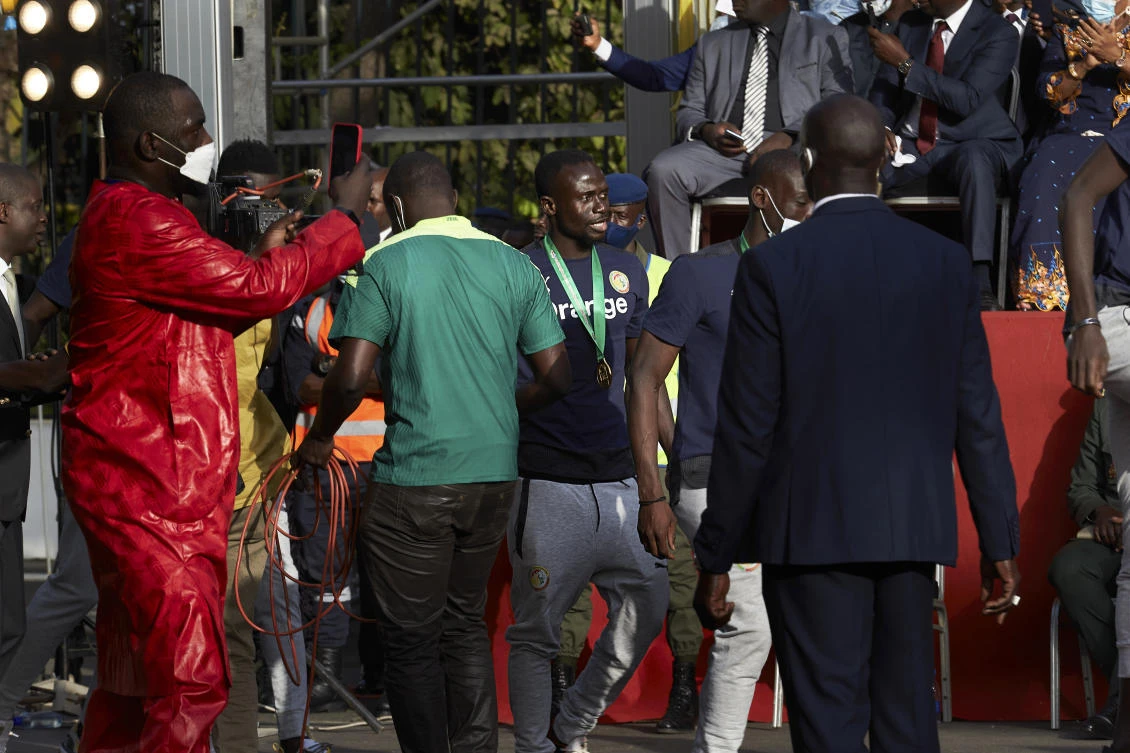 Senegalese footballer Sadio Mane, center, arrives for a ceremony to mark the country’s African Cup win, at the presidential palace in Dakar, Senegal on Tuesday. (AP)