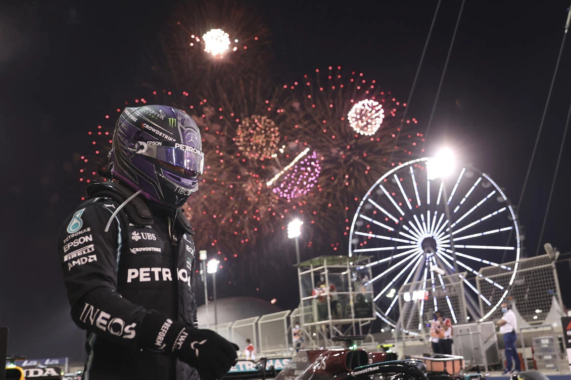 Mercedes driver Lewis Hamilton of Britain celebrates after winning the Bahrain Formula One Grand Prix at the Bahrain International Circuit in Sakhir, Bahrain, on March 28, 2021. (AP/File Photo)