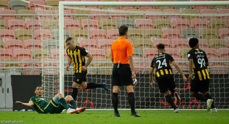 AL-Ittihad's Abderrazak Hamdallah (second left) celebrates scoring against former club Al-Nassr