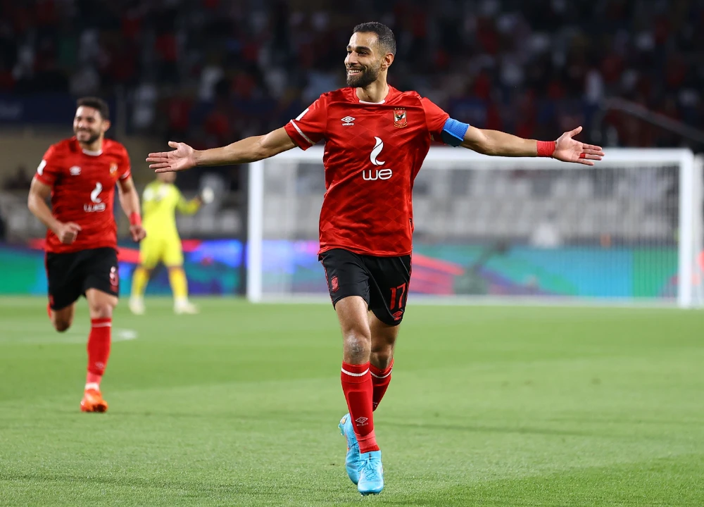 Al-Ahly players celebrate their fourth goal of the night against Al-Hilal. (Photo by Basheer Saleh)